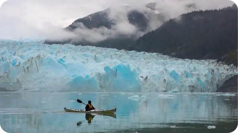 Kayaker near Mendenhall Glacier Juneau for Alaska travel